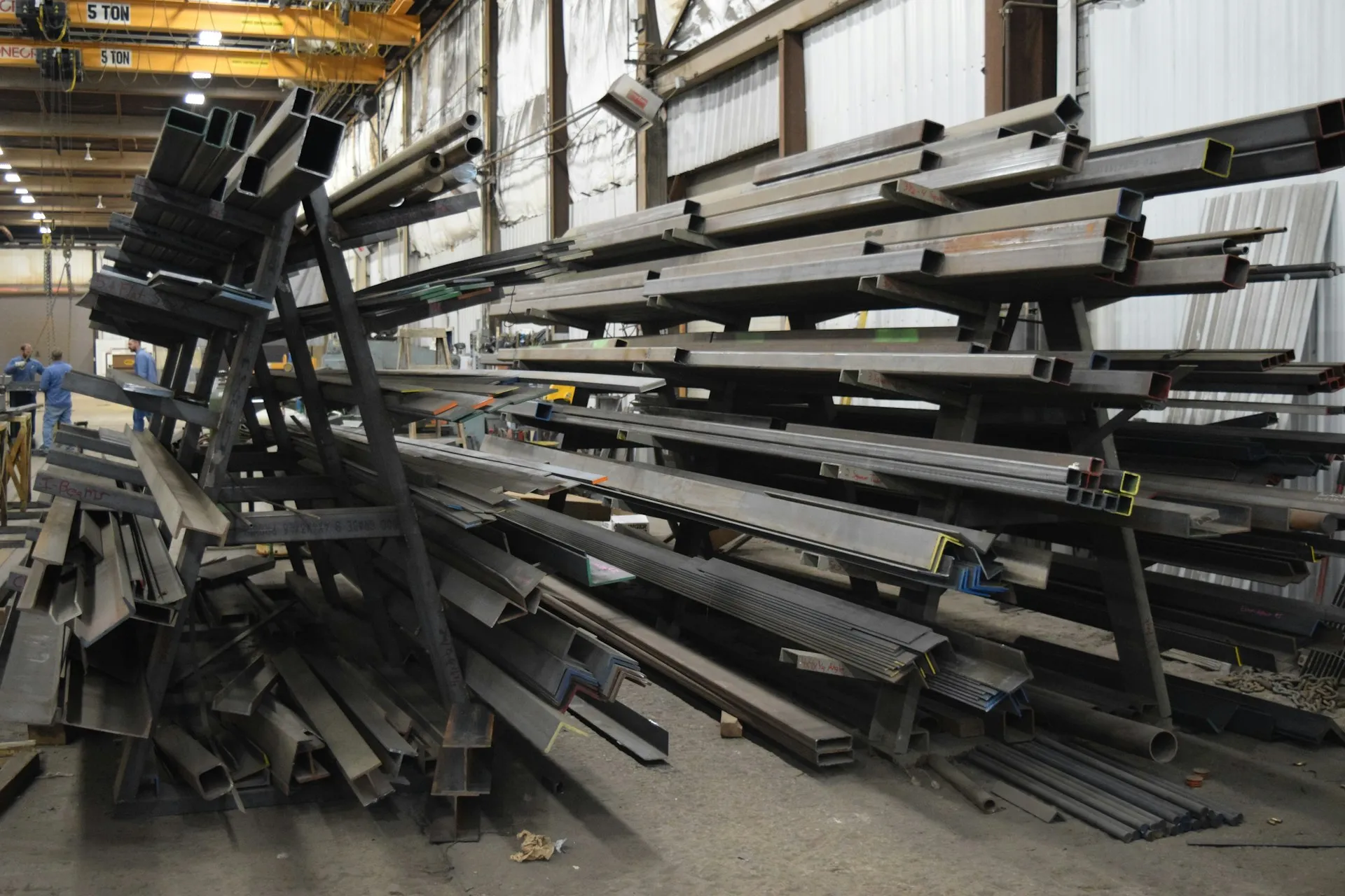 Stacks of structural steel sections in a steel stockyard
